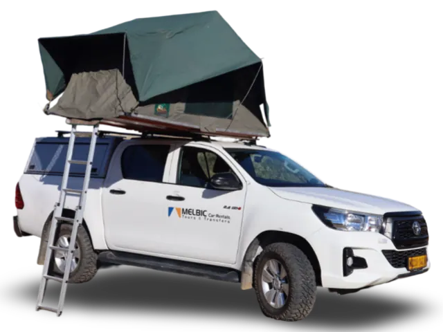 An image of a Toyota Hilux 4x4 2.4L Diesel, the ideal rental car for a 4x4 self-drive safari adventure in Namibia.